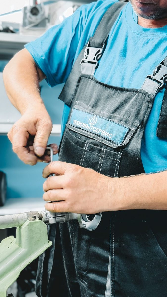 Plumber repairing bathroom plumbing after a toilet overflow in Plano, TX
