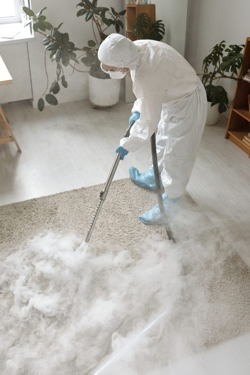 Professional carpet cleaning service drying wet carpet in Plano, TX