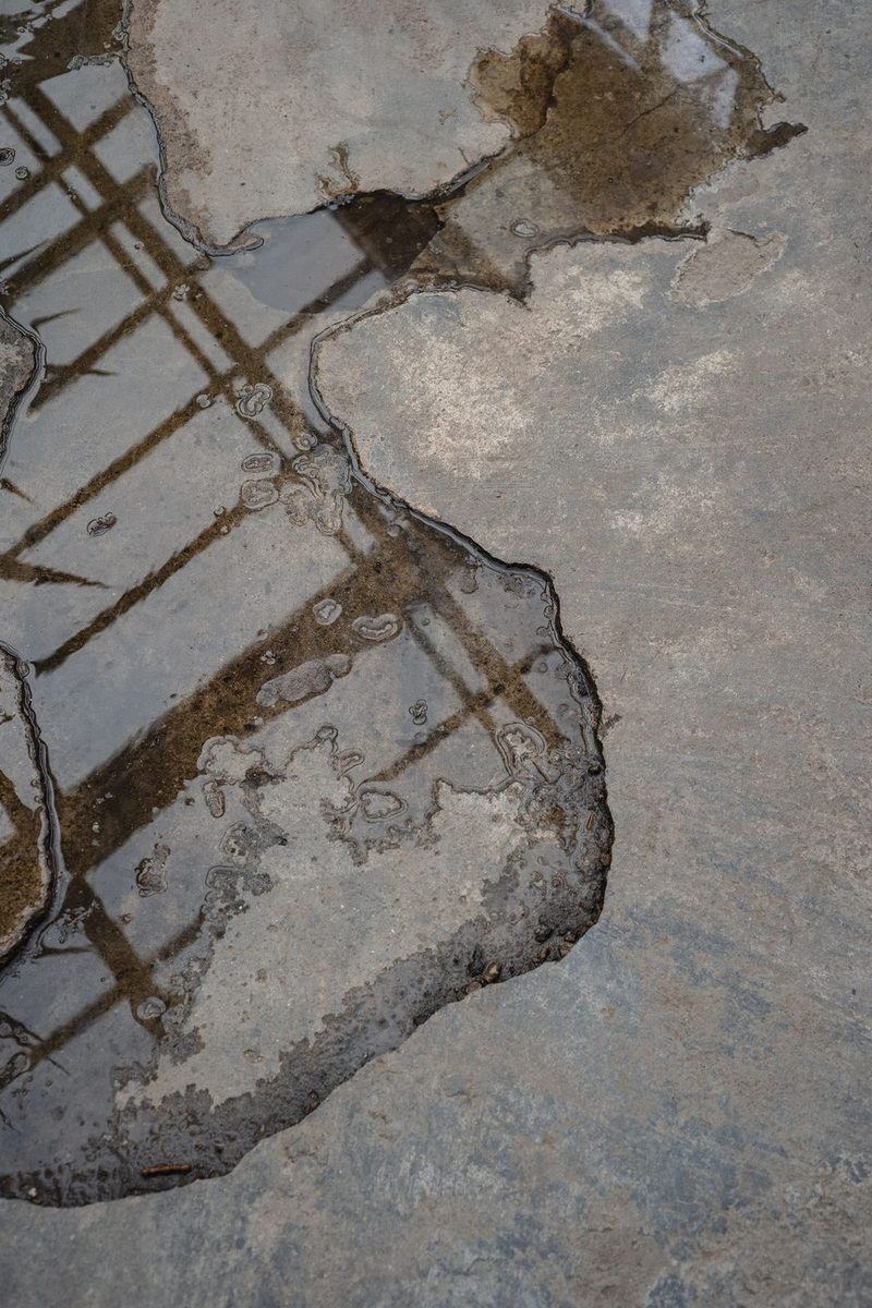 Water pooled on the floor from a leaking appliance in Plano, TX