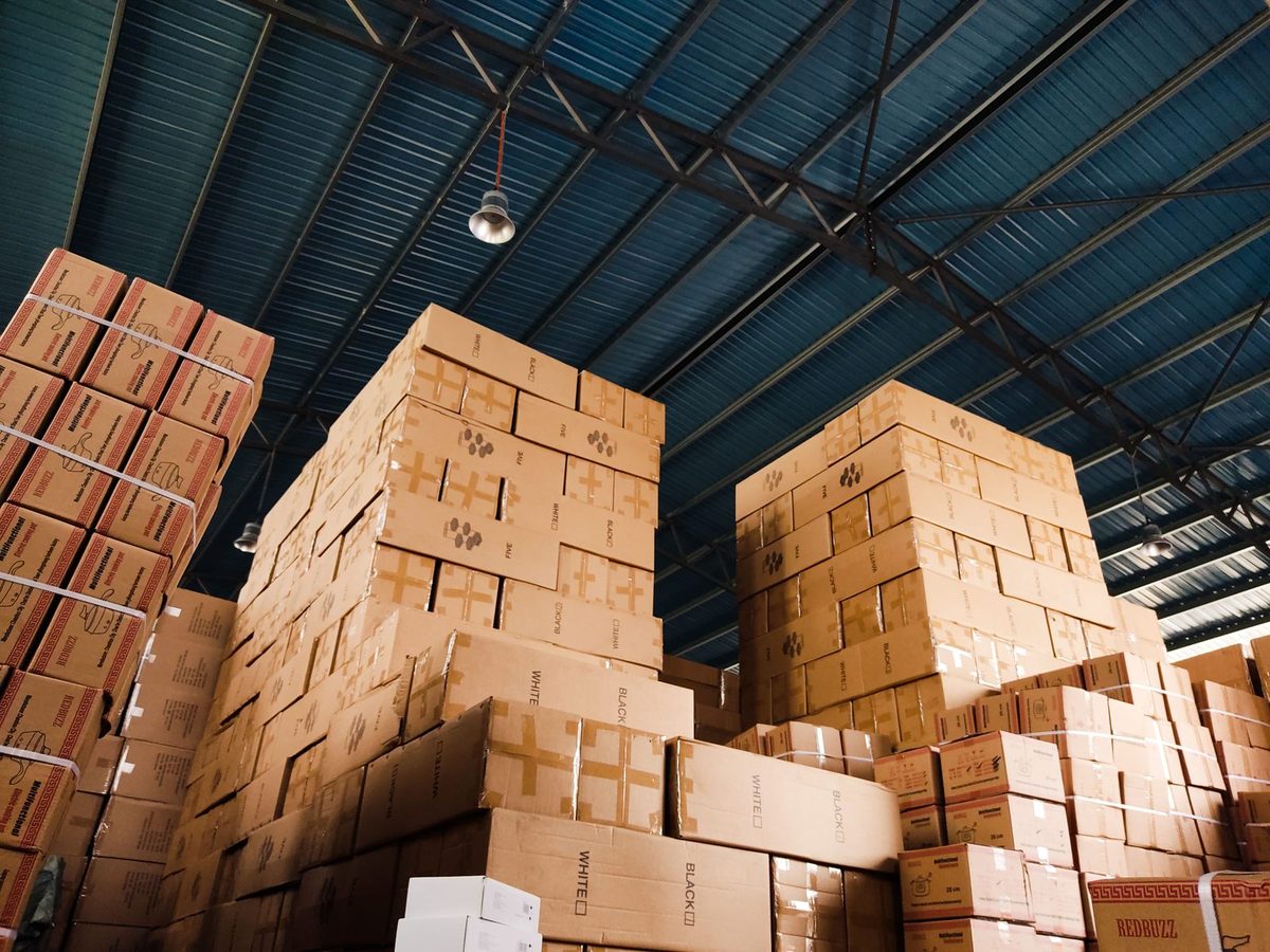 Packed boxes stored securely in a warehouse during contents pack-out in Plano, TX