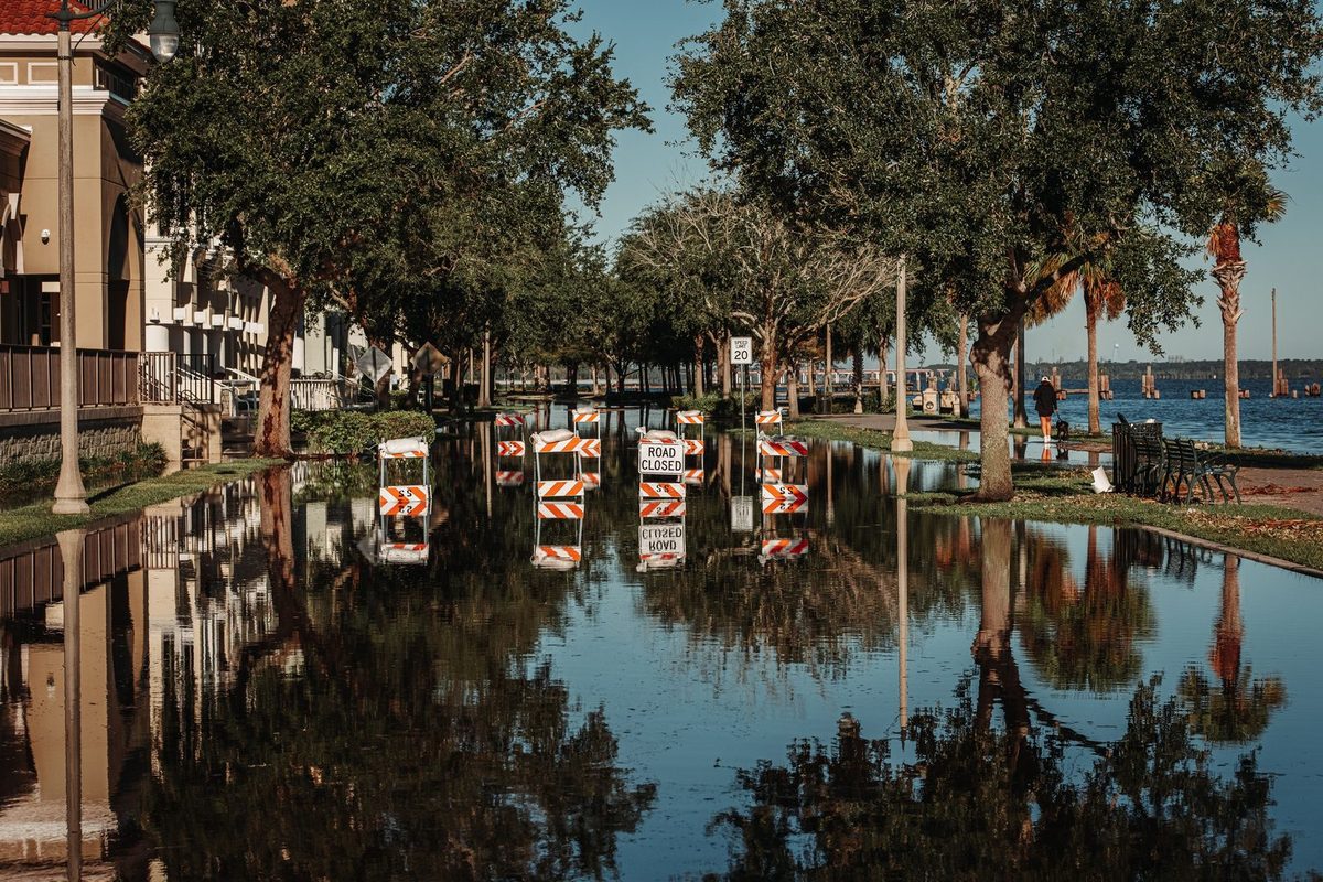 Flooded street after heavy rain during flood damage restoration in Plano, TX