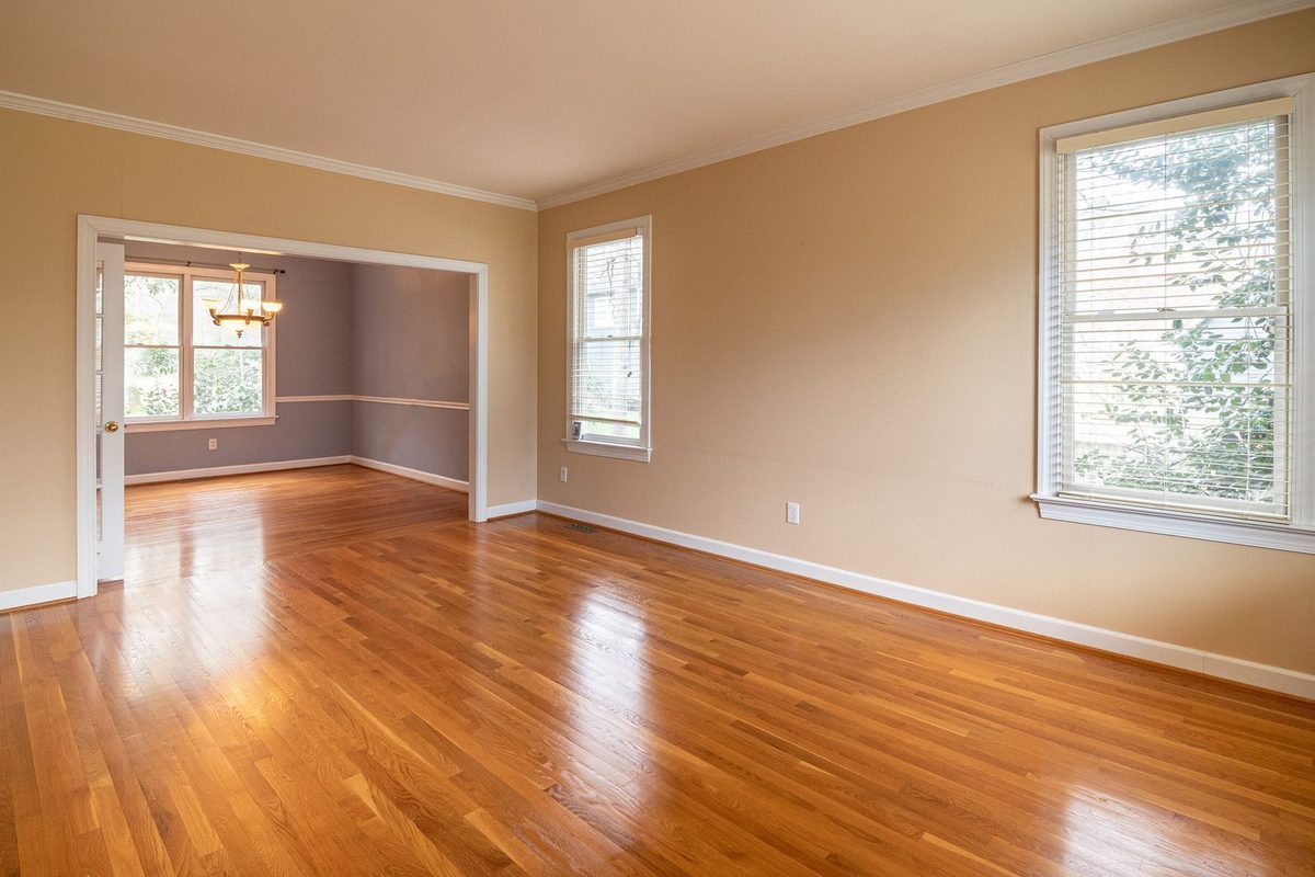 Refinished hardwood floors restored after water damage in a Plano, TX home